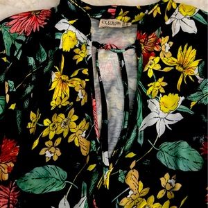 Floral midi dress with open back and bell sleeves